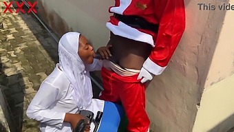 Get In The Holiday Spirit With A Naughty Santa And A Seductive Hijab-Wearing Babe.